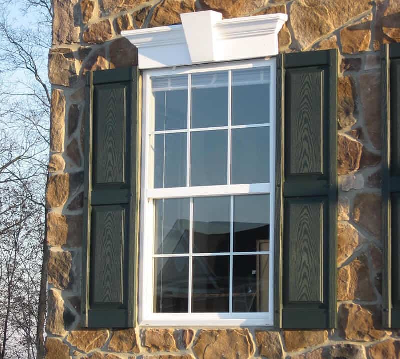 Exterior view of a SoftLite single hung window in a home