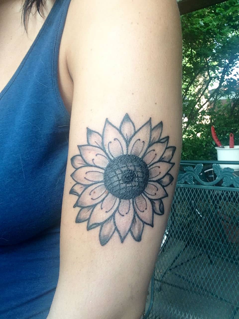 They stand tall—taller than many other garden b. 24 Warm Sunflower Tattoo Designs