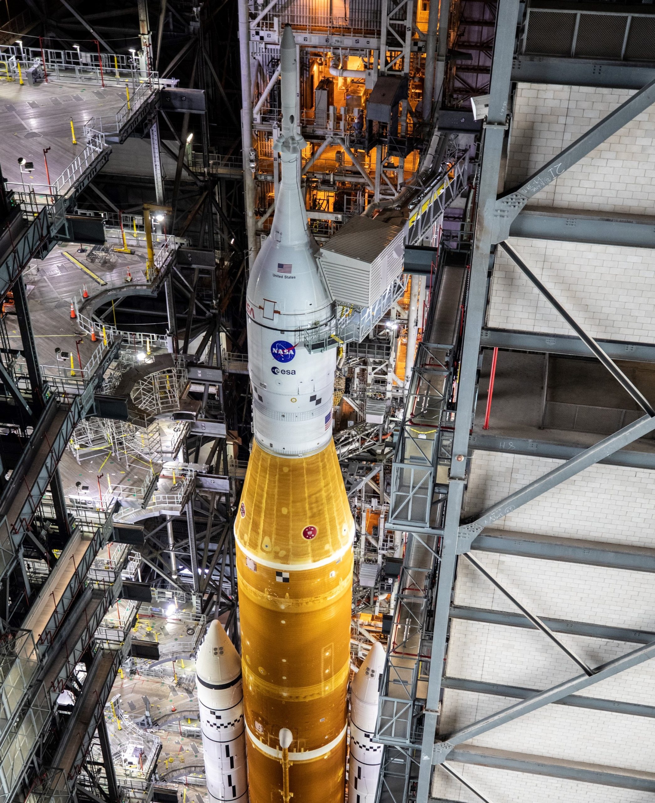 SLS Unveiled in VAB as NASA Retracts Last Work Platforms Ahead of