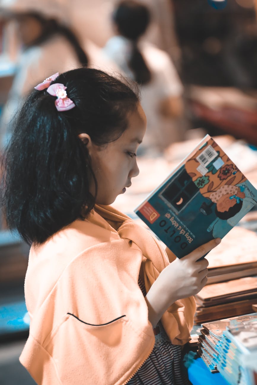 girl holding a story book