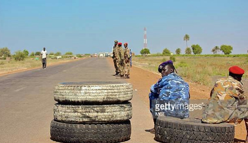 Soldiers manning a checkpoint along Juba-Nimule road [Photo via Getty Images]