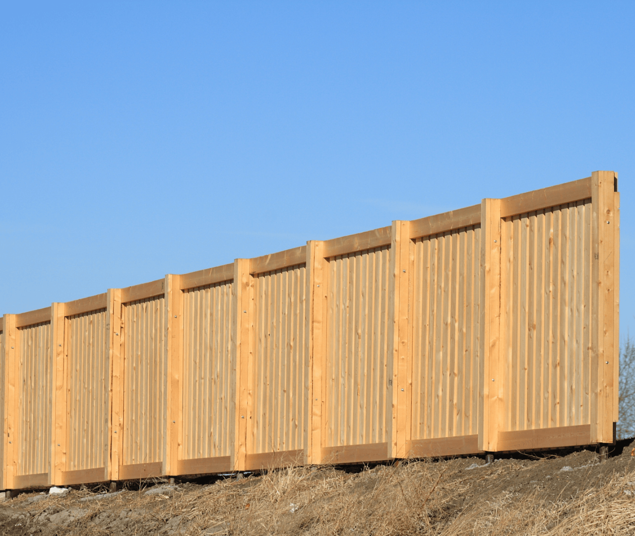 Professional fence contractor installing wood and vinyl fencing in Portland, Oregon