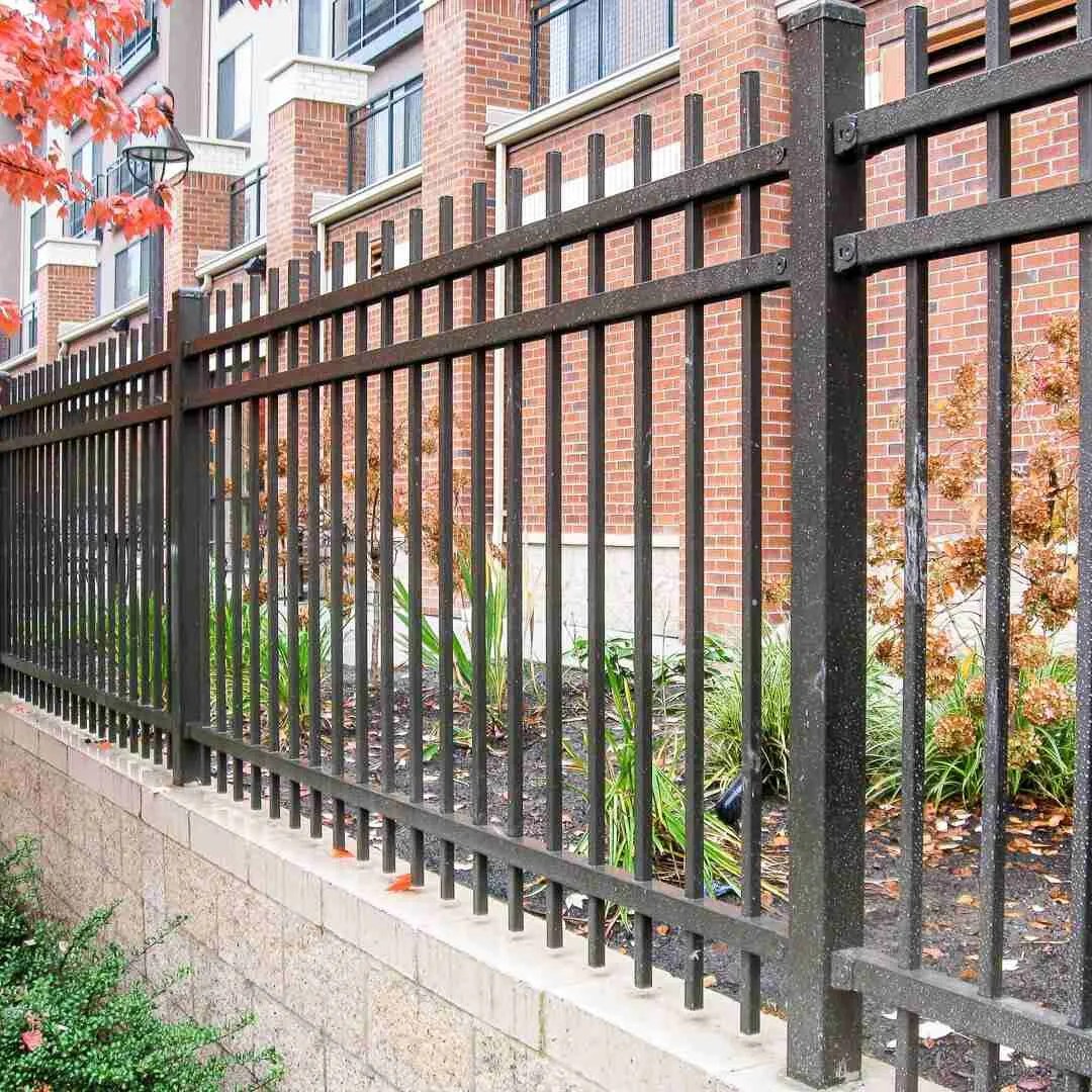 Professional fence contractor installing wood and vinyl fencing in Portland, Oregon