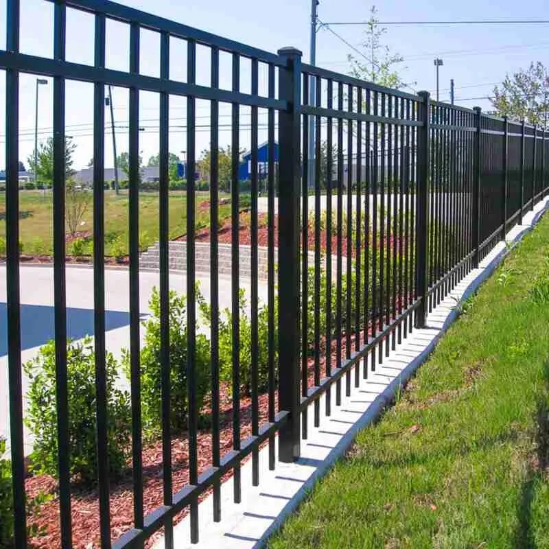 Professional fence contractor installing wood and vinyl fencing in Portland, Oregon