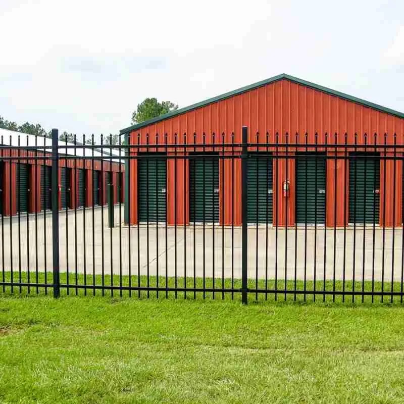 Professional fence contractor installing wood and vinyl fencing in Portland, Oregon