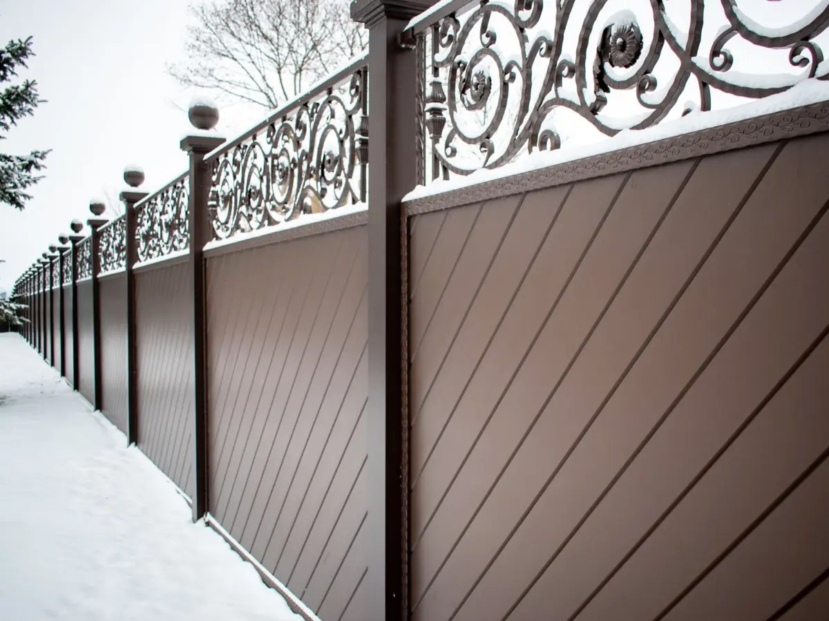 Professional fence contractor installing wood and vinyl fencing in Portland, Oregon