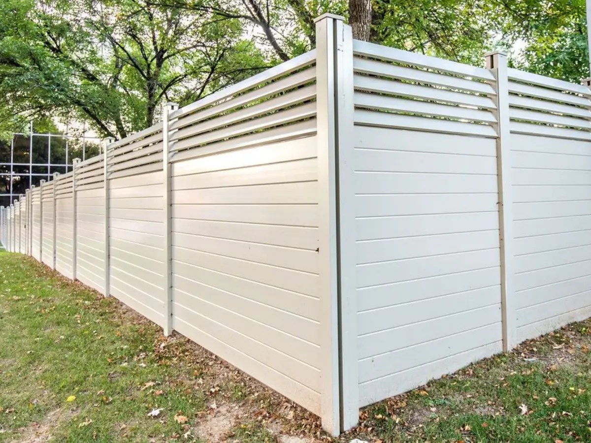 Professional fence contractor installing wood and vinyl fencing in Portland, Oregon
