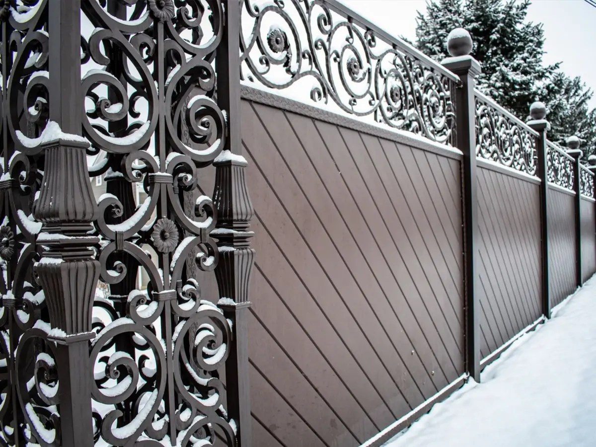 Professional fence contractor installing wood and vinyl fencing in Portland, Oregon