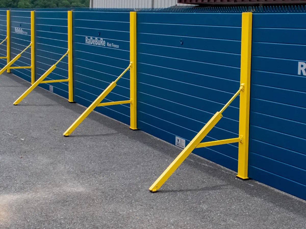 Professional fence contractor installing wood and vinyl fencing in Portland, Oregon