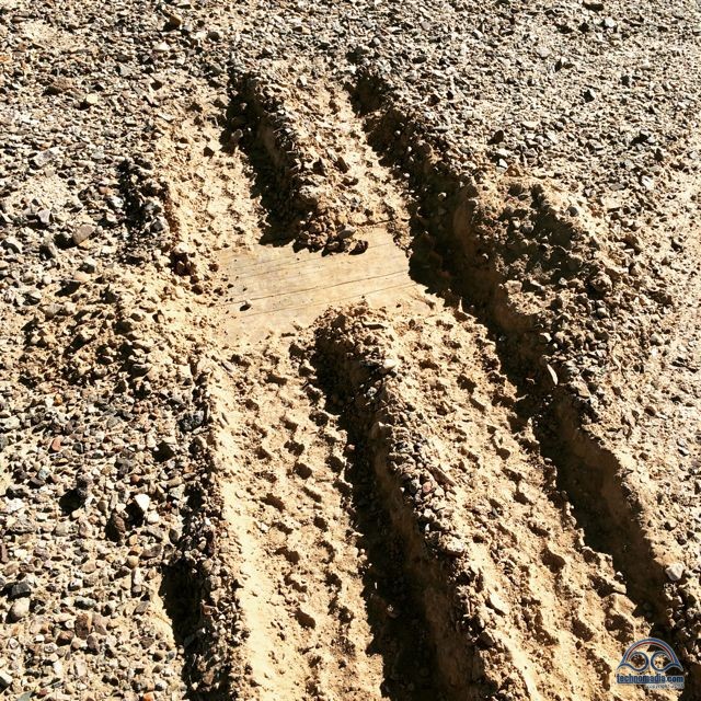 Oops.... hit a soft spot. No worries, a couple boards and some oomph on the throttle got us out to safe ground.