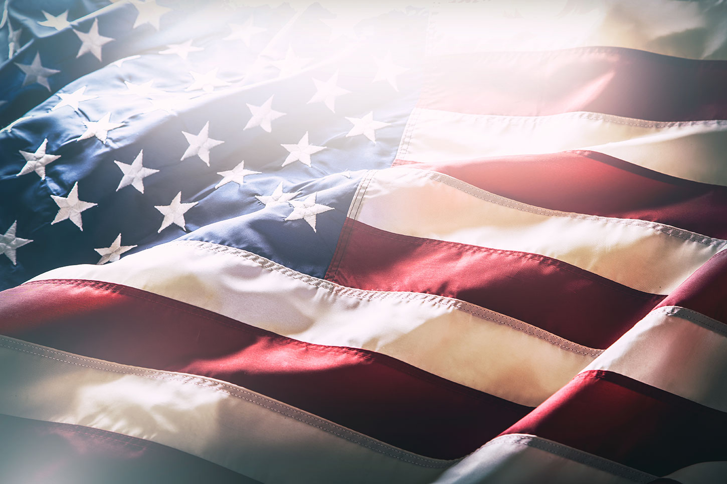 American flag with sunlight