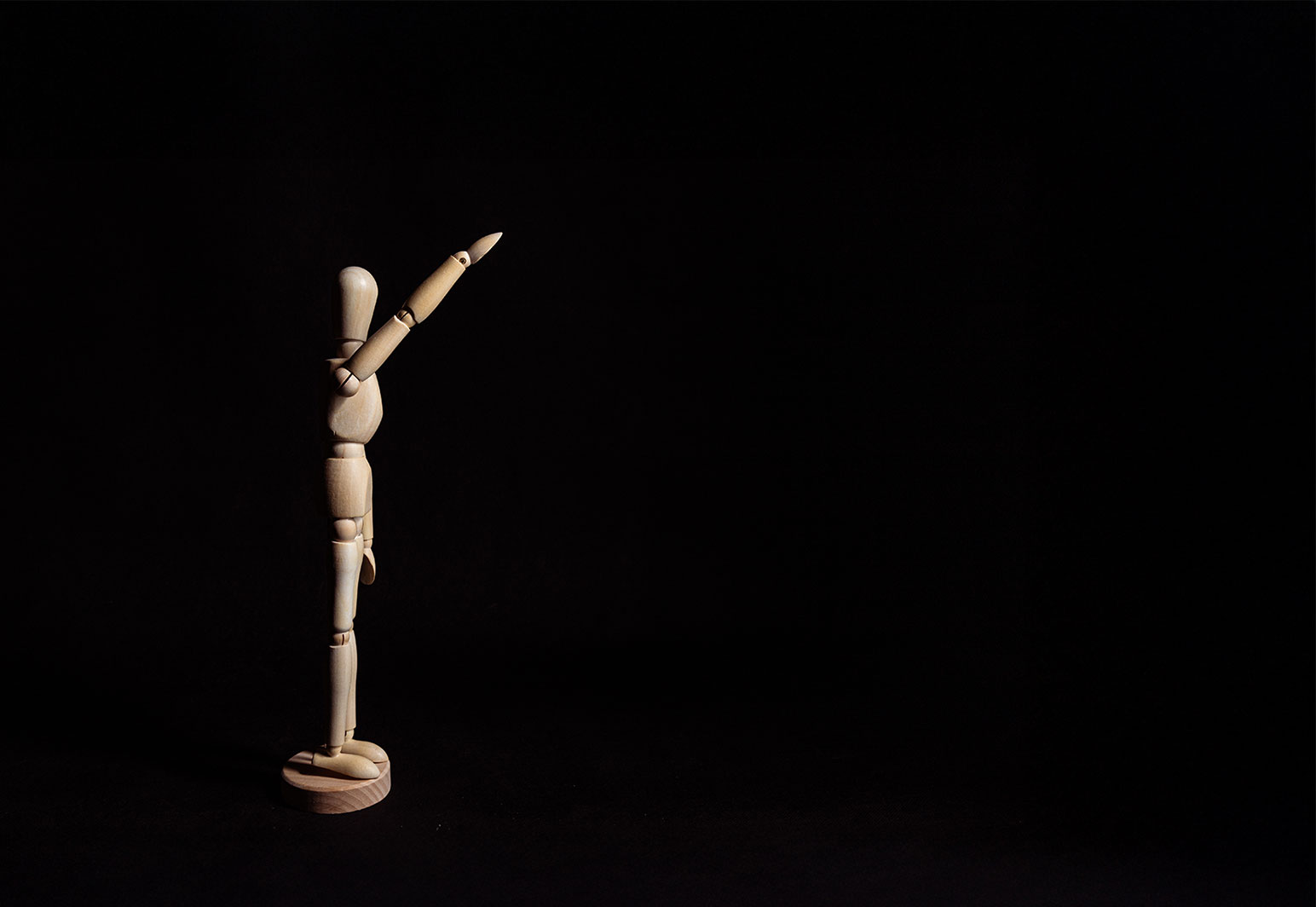 Wooden figure Nazi salute