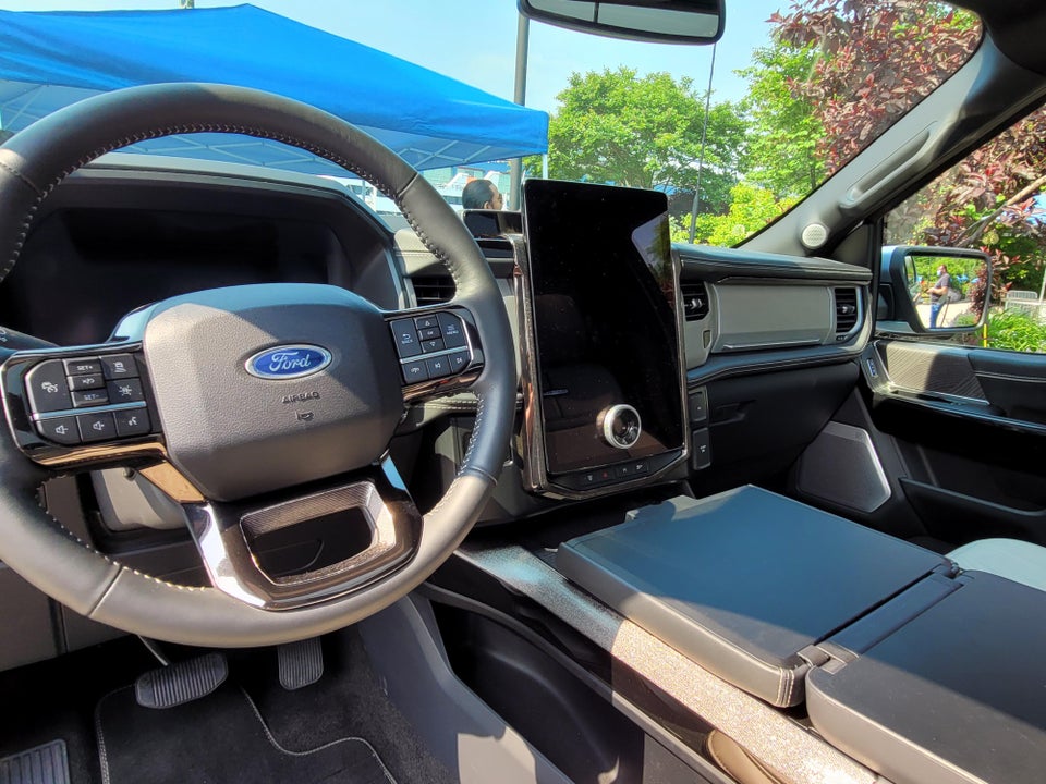 The trims used around the infotainment screen also give out a. ford-f150-lightning-interior - TESLARATI