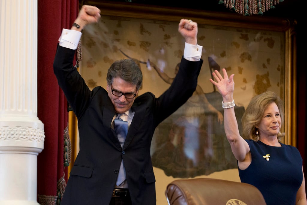 Governor Rick Perry and First Lady Anita Perry acknowledge cheers in the House chamber on their final appearance to the Texas Legislature on Jan. 15, 2015.