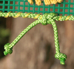 close up of cording knot on sunflower earring organizer