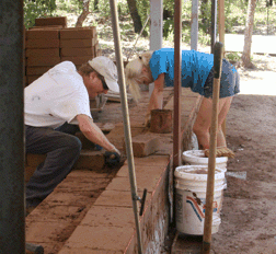 Van and Eva building wall