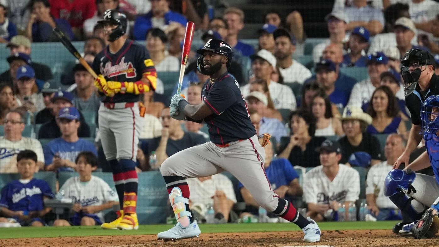 Michael Harris watches one of his hits.