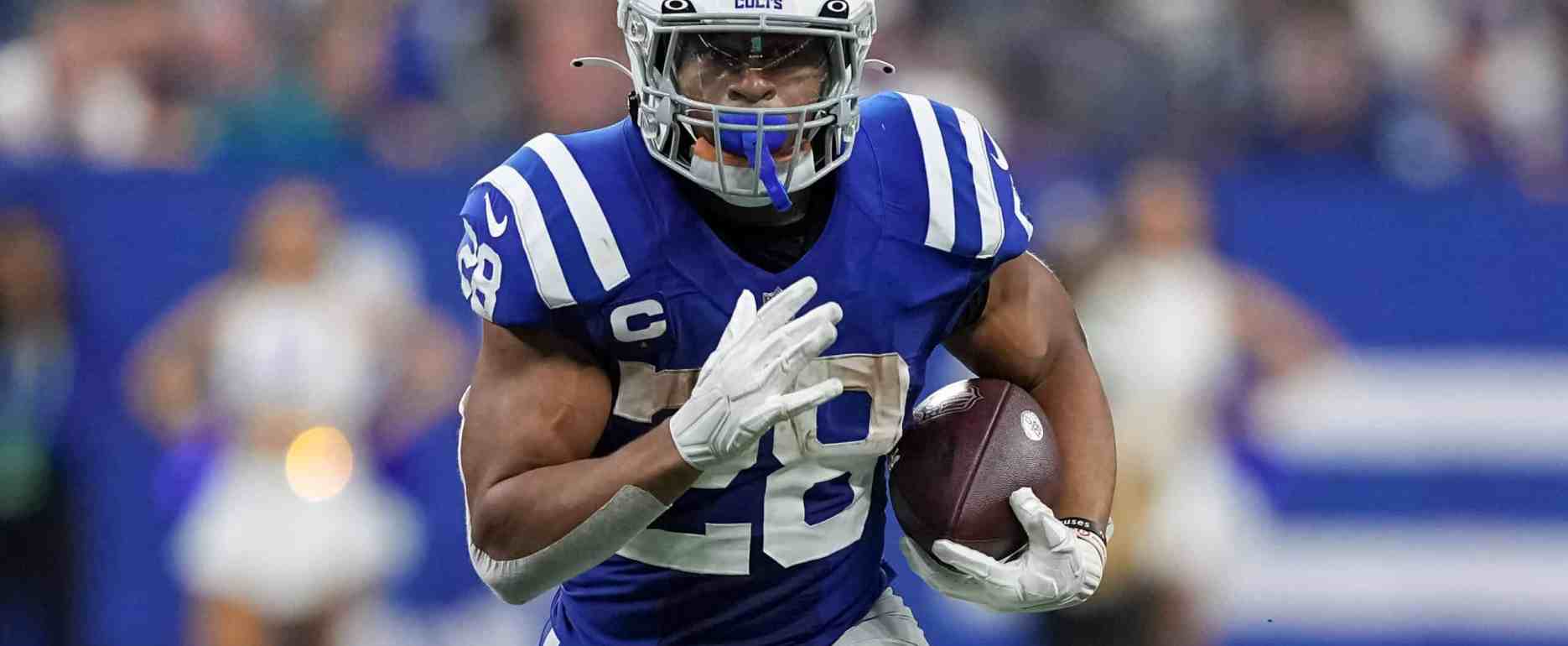 INDIANAPOLIS, IN -- OCTOBER 30TH: Jonathan Taylor #28 of the Indianapolis Colts runs the ball in the third quarter against the Washington Commanders at Lucas Oil Stadium. (Photo by Dylan Buell/Getty Images)