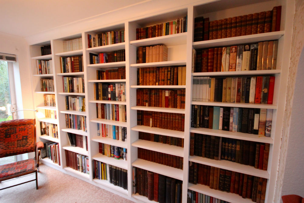 Library shelving providing reading room in Epsom The BookCase Co