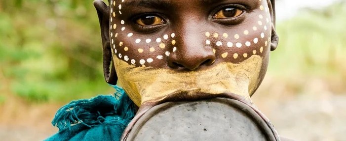 Lip plates were a mark of manhood and great pride for the kayapo. Surma Lip Plates The Glimpse