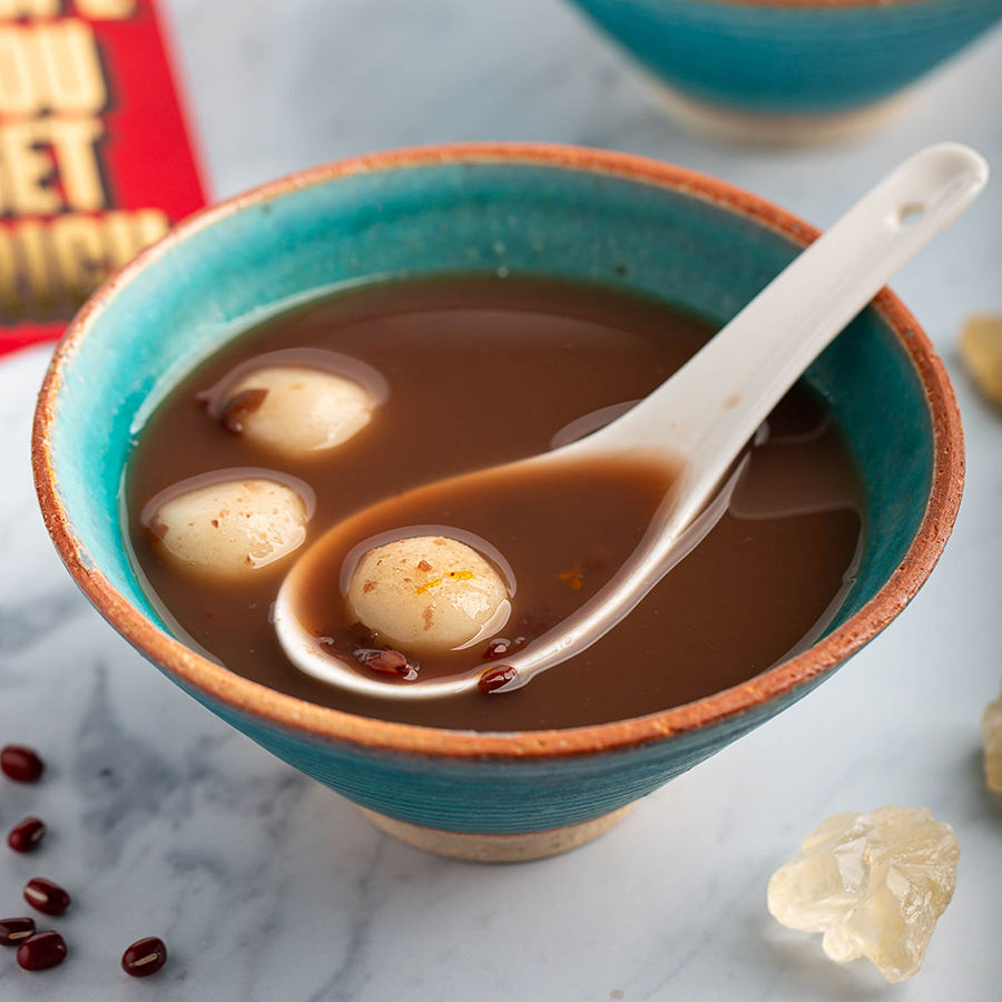 Sweet Red Bean Soup with Rice Dumplings | This dessert soup is mildly sweet w/ little chewy mochi balls. Perfect for Lunar New Year celebration! #redbean #dessertsoup #orange #dessert #glutinousricedumpling #mochi #adzukibean #lunarnewyear #chinesenewyear #chineserecipe #dessertrecipe | The Missing Lokness