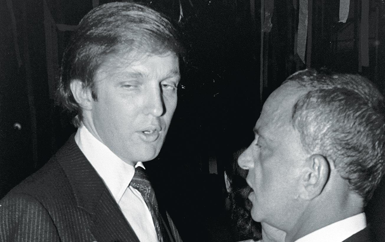 Trump and Cohn chat at the president’s 33rd birthday party in New York City.