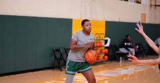 Baylor's Dre'Una Edwards holds the ball during practice.