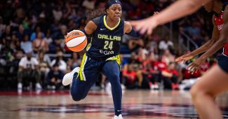 Arike Ogunbowale dribbling the ball in a game against the Mystics.