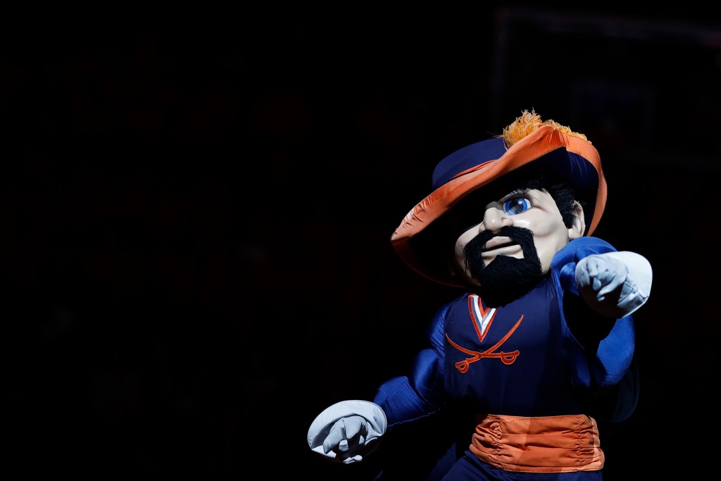 CavMan, the Virginia Cavaliers mascot dances on the court.