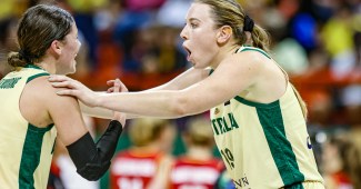 A shocked Sara Blicavs grabs Jade Melbourne's shoulders. They're playing for the Australian Opals at the OQT