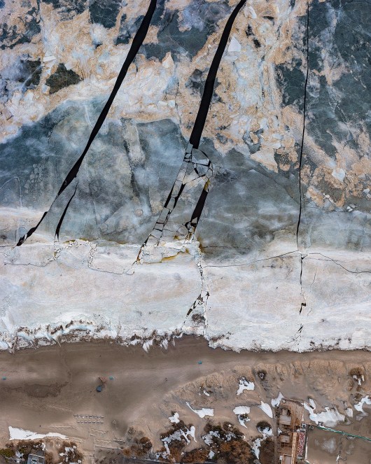masses of ice and snow fracture on the landscape
