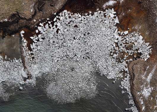 masses of crushed ice and snow fracture on the landscape