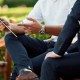 two men using tablet