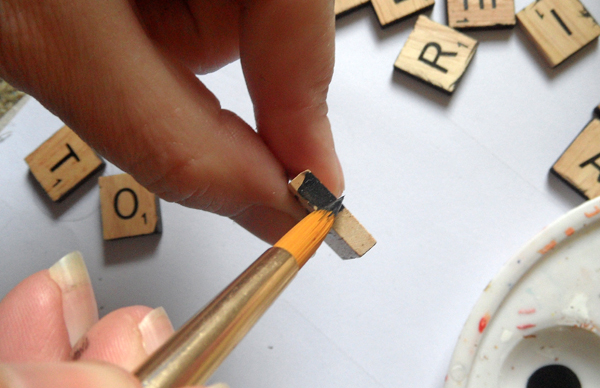 Paint the edges of the tiles with acrylic paint for neatness
