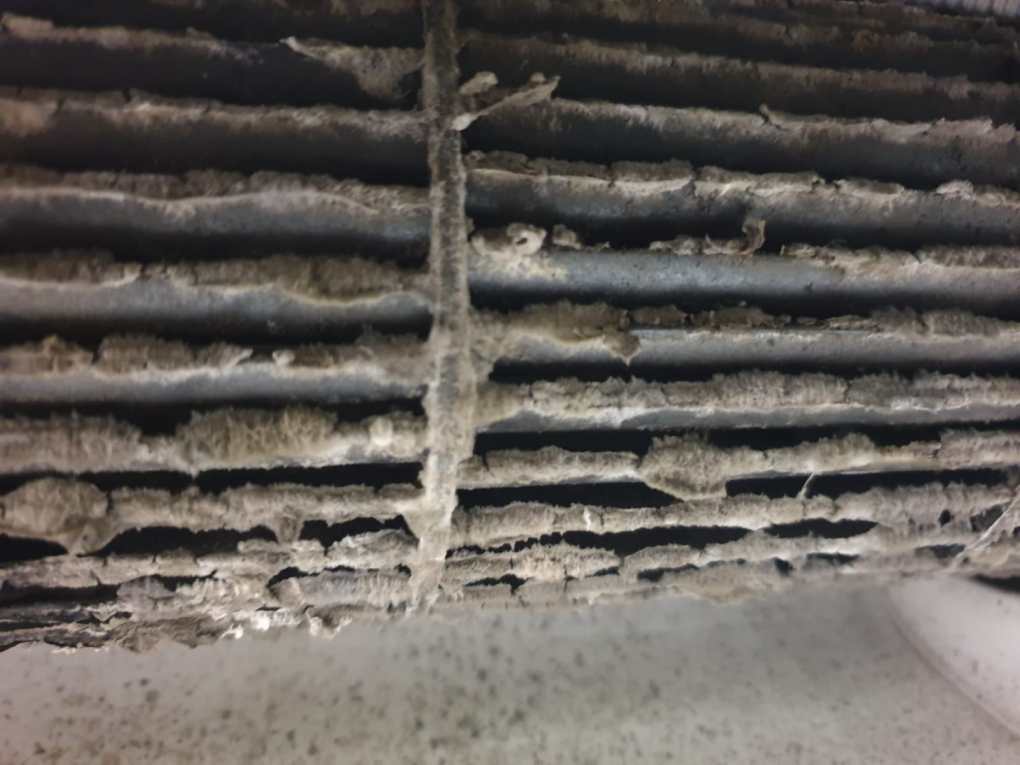 Dirty wall mounted air con filter