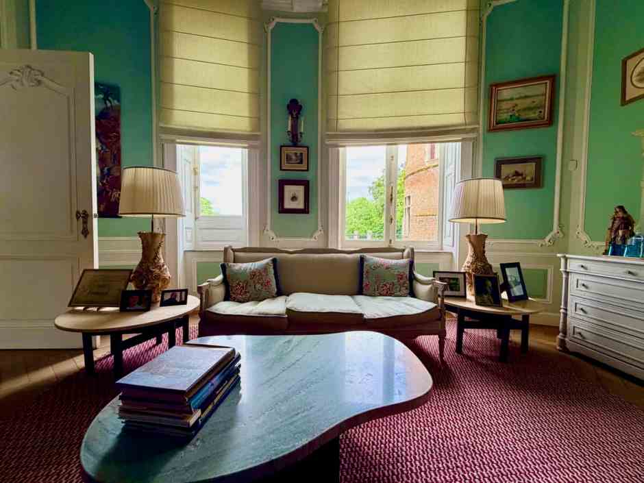 sitting room with sofa and red carpet