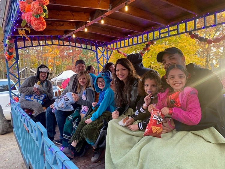 Parents smiling with kids