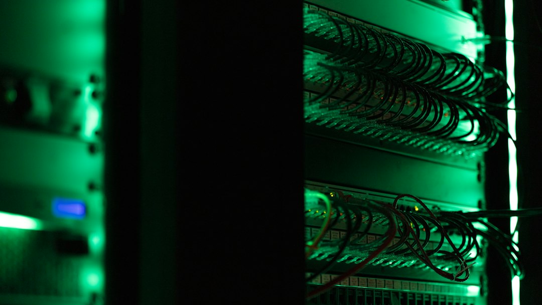 Rack of server equipment in a data centre, representing the DevOps roadmap for freshers