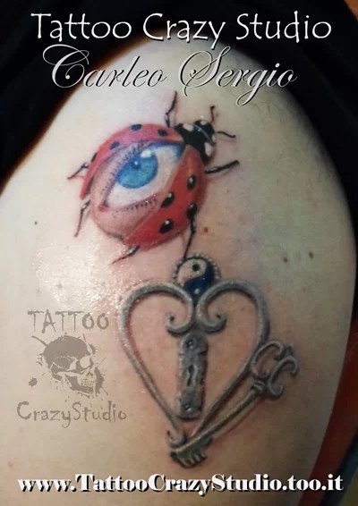 Coccinella Con Occhio - Tuttotattoo.com 566_x_400_jpg