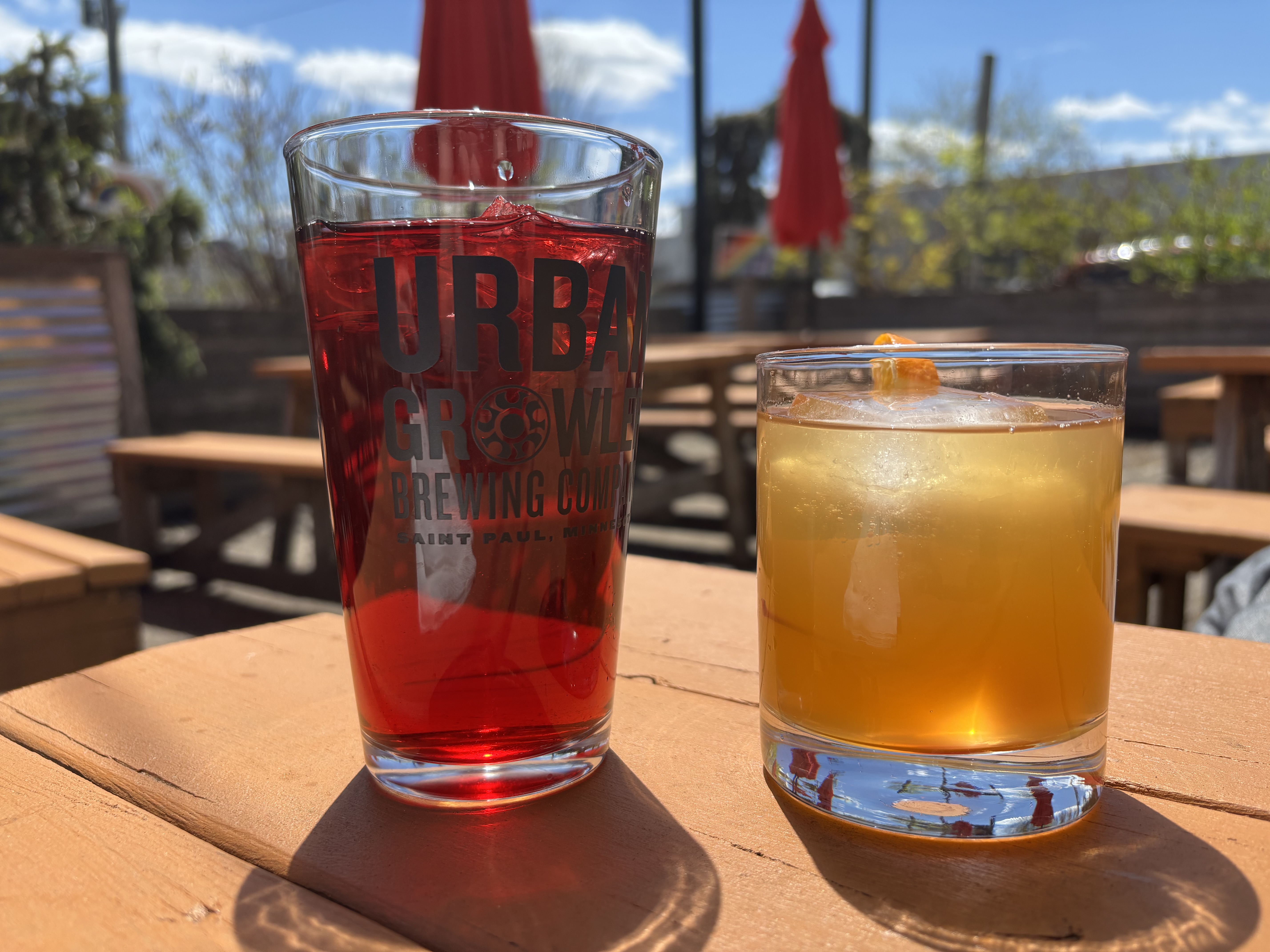 Two drinks on a picnic table