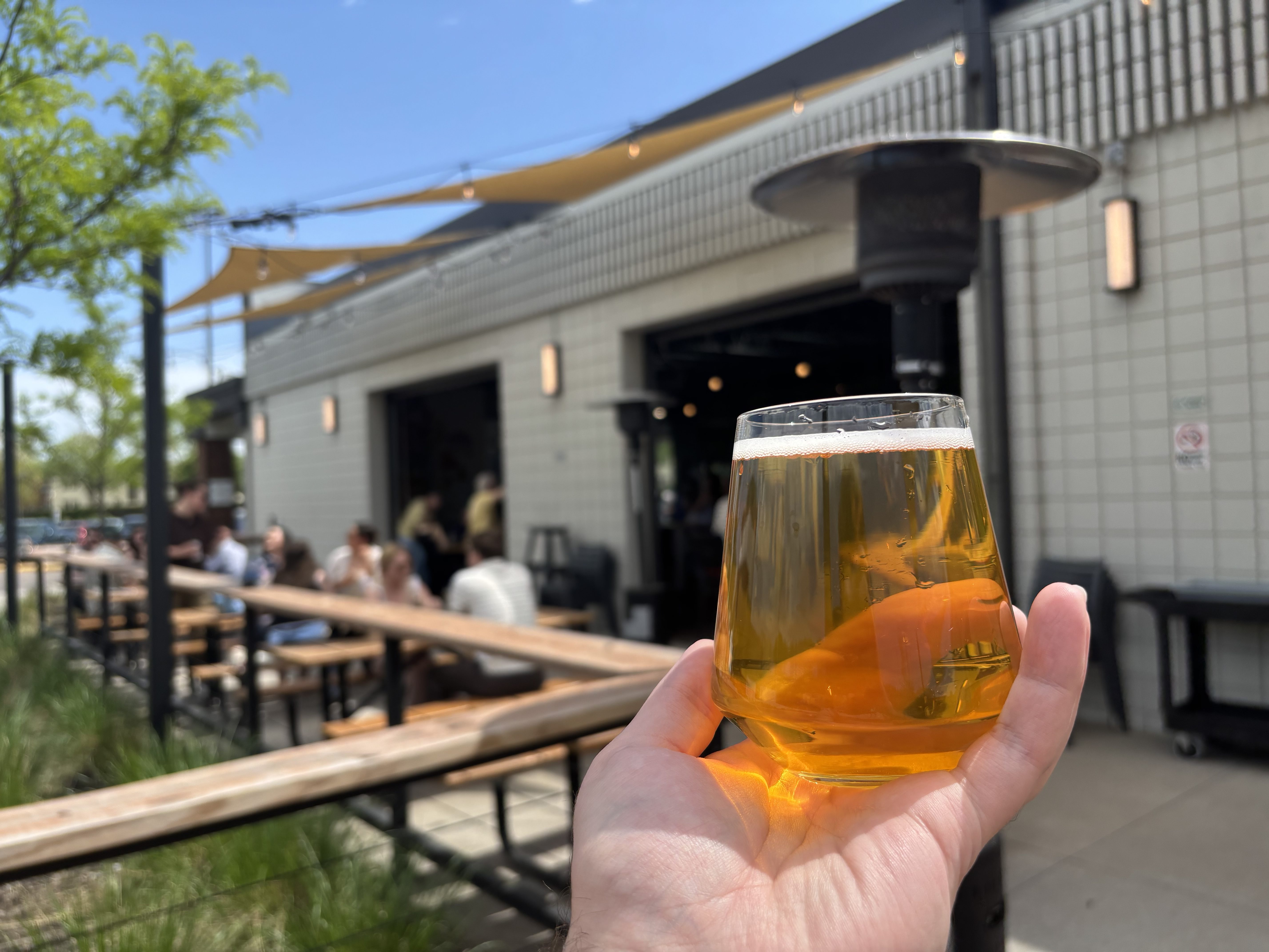 A drink in a person's hand