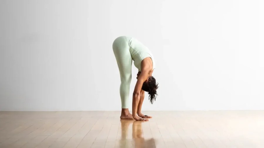Uttanasana (Standing Forward Bend) one of the 5 Bedtime Yoga Asanas to Beat Stress, Boost Sleep Quality
