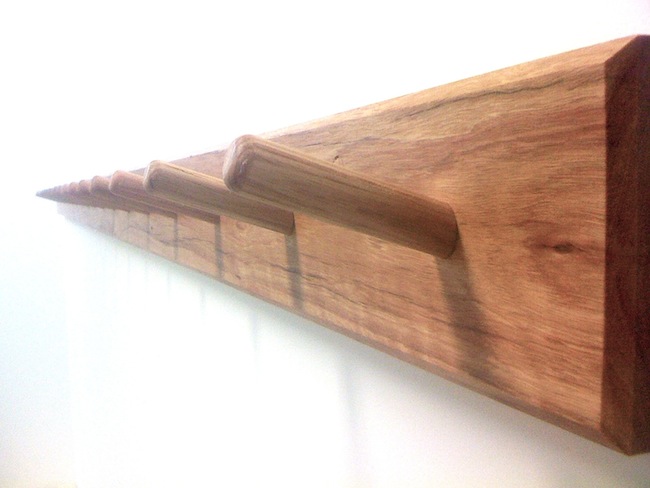 Coat hooks all wood rack of pegs