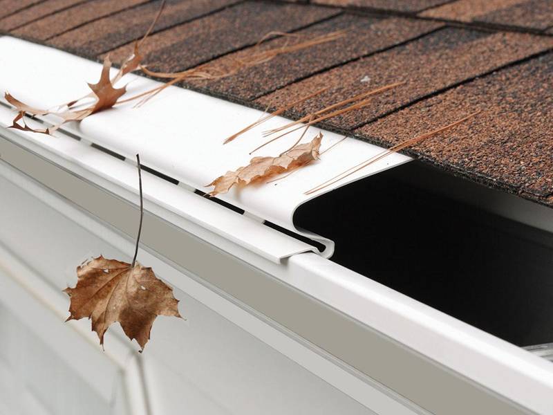 Gutter guard cover for gutters in roof of house, villa, apartment