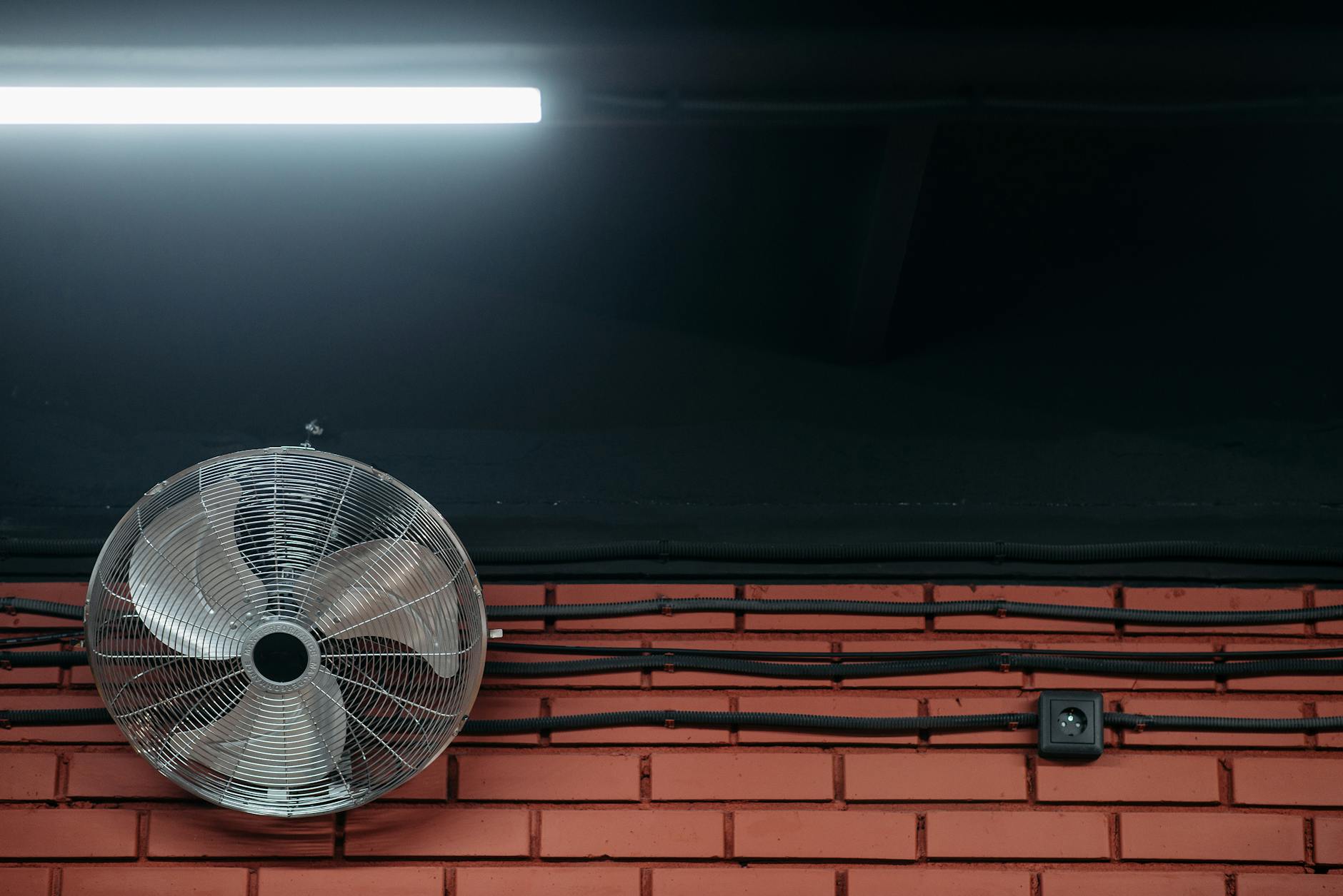 electric fan under a fluorescent light