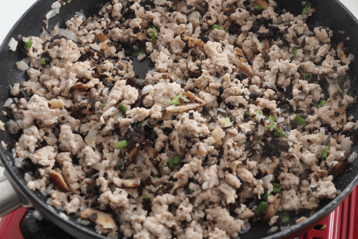 Cooked pork mince in a pan.