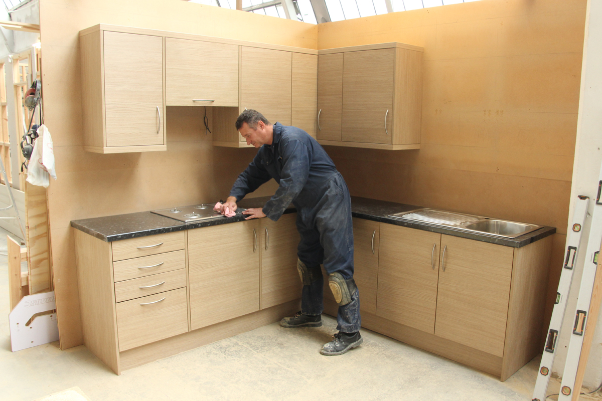Fitting a hob on kitchen fitting course