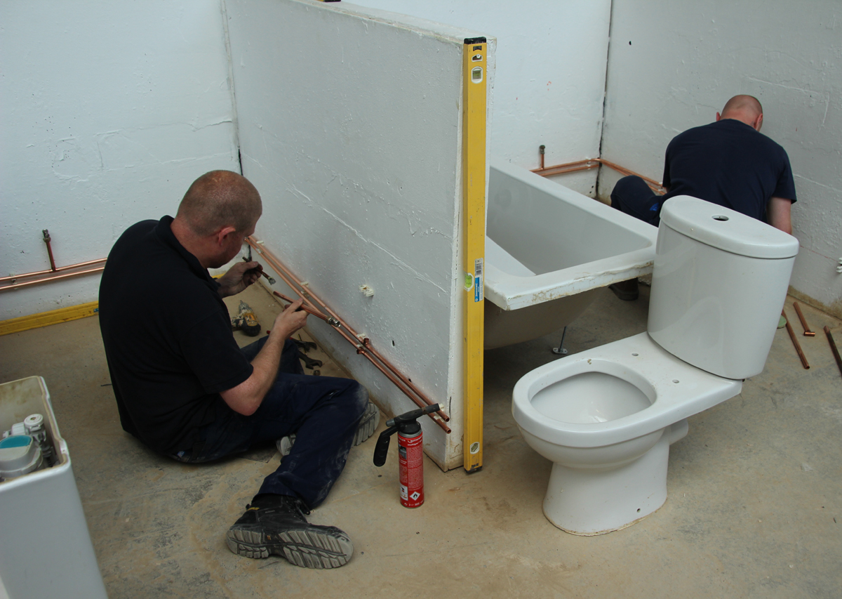 First fix hot and cold water supply to bathroom