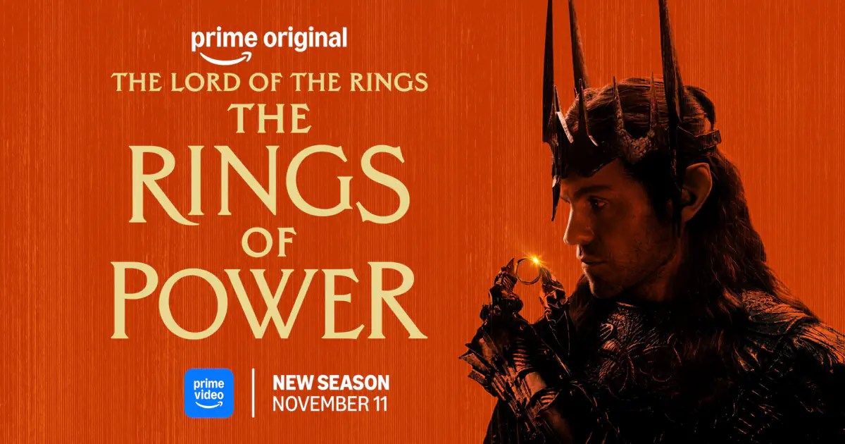 โปสเตอร์ The Rings of Power ซีซั่น 3 โทนสีส้ม พร้อมตัวละครสวมมงกุฎถือแหวนและข้อความเริ่มซีซั่น 11 พฤศจิกายน