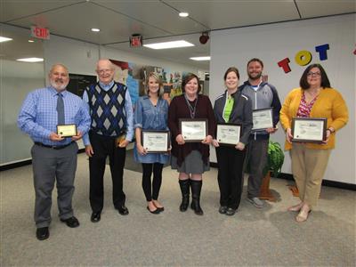 (left to right): Flip Johnson, Ron Sampsel, Stacy Winter, Jill Knaack, Kristen Smith, Andrew Gray and Ginger Kesler.